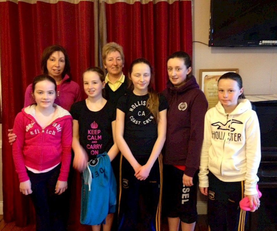 Junior girl golfers with Lady Captain Carmel Vekins and Junior Girls Convenor Helen McMahon